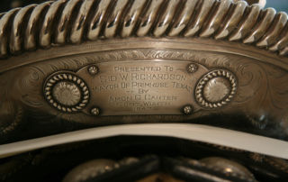 detail of back of saddle with inscription