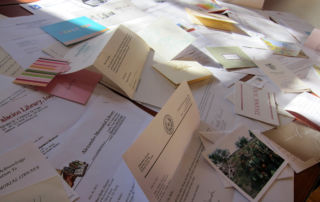 piles of thank you letters