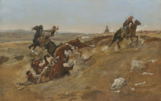 A cow knocks one of the herding cowboys and his horse to the ground.