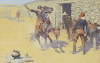 A cowboy on horseback comes to a halt with his hand in the air in front of two standing cowboys.