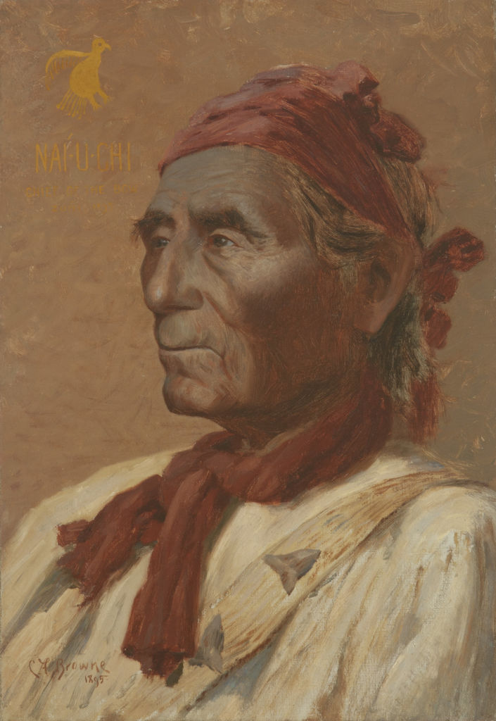 A bust length portrait of a Zuni elder.