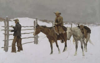 One cowboy on horseback with a cowboy closing a wooden gate in the snow