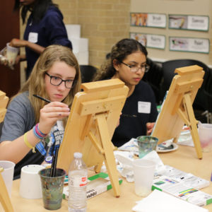 teen girls painting