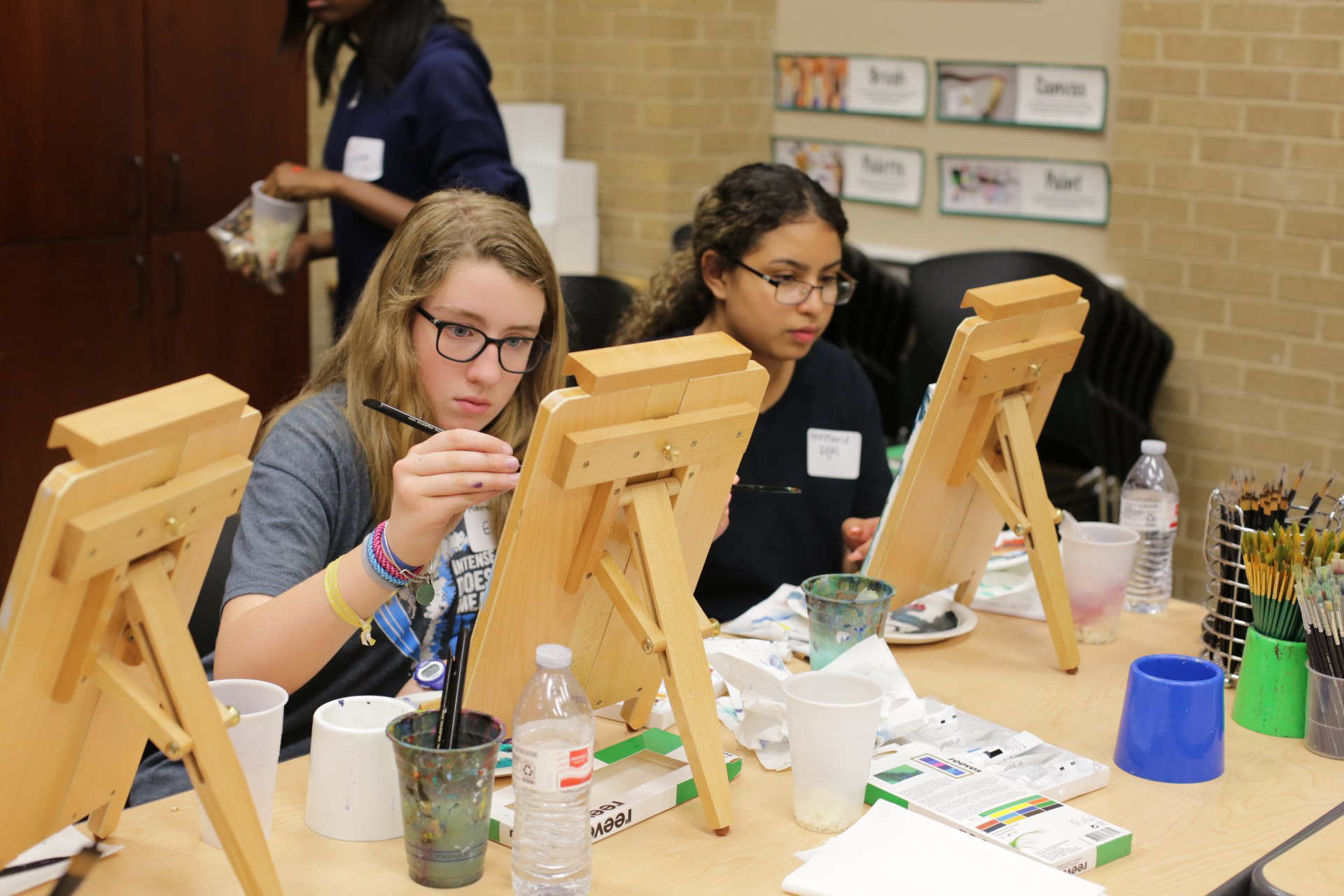 teen girls painting