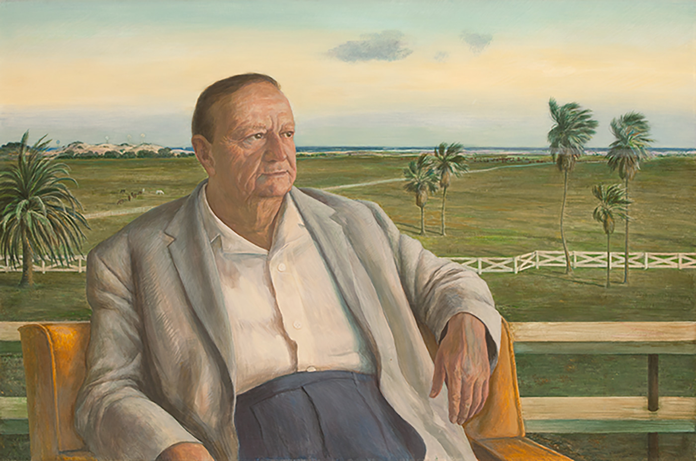 A portrait of a man seated in front of a landscape.