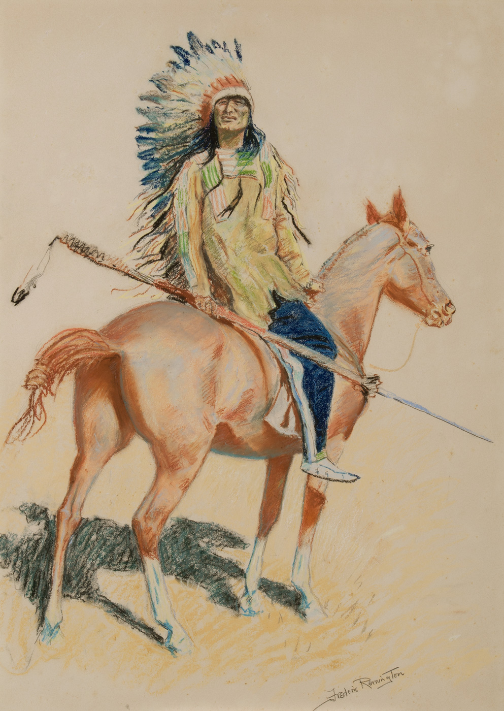 A Sioux chief in a headdress sits on a horse.