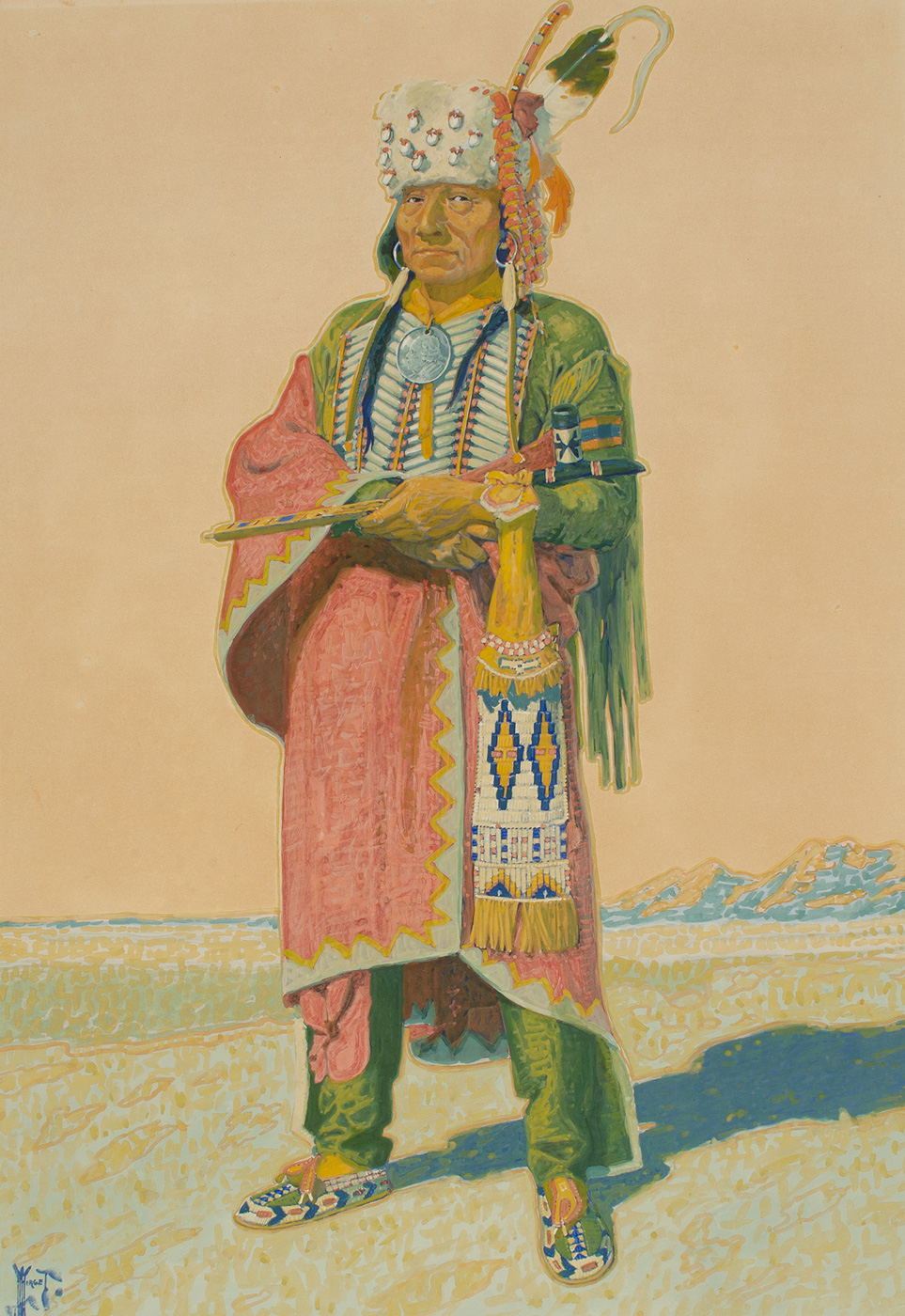 A full length portrait of an Arapaho man in tribal clothing.