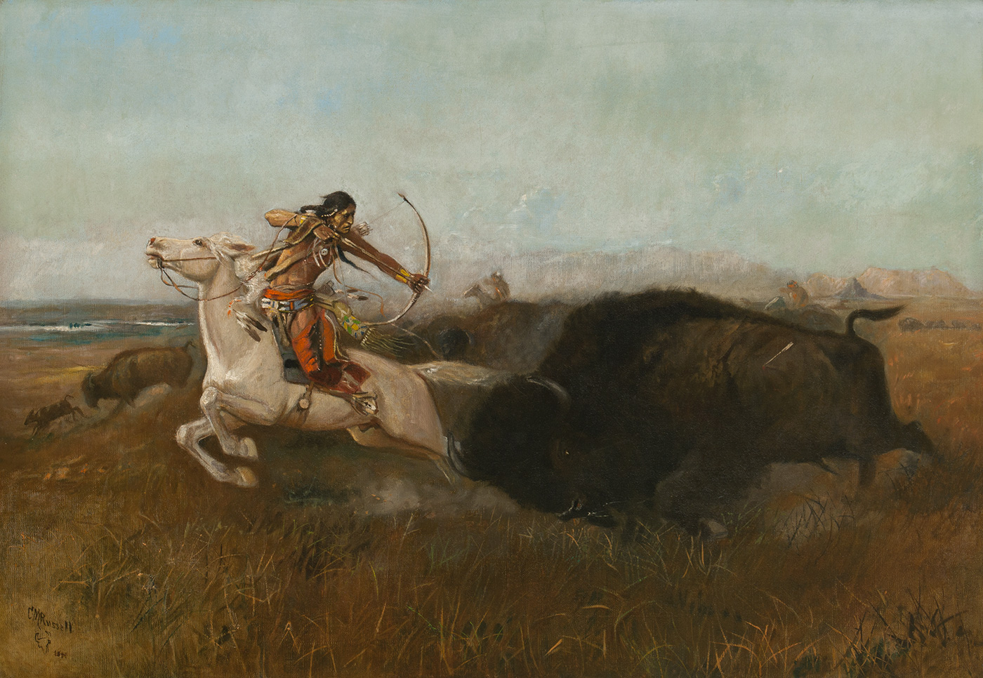 At full gallop, an indigenous American man on a white horse aims a bow and arrow at a running bison.