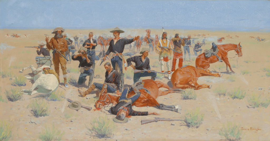 A diverse group of men including soldiers and indigenous Americans aim and shoot their rifles from behind fallen horses.