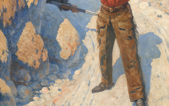 A masked man with a rifle stands blocking a mountain path.