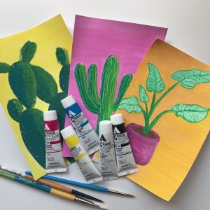 three paintings with gouache paint tubes and paint brushes