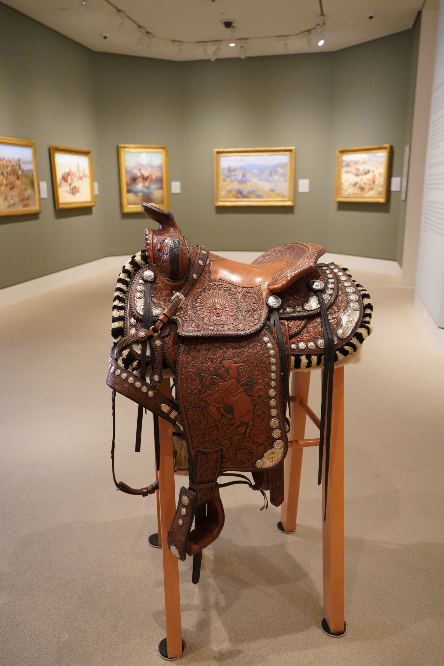 a brown leather parade saddle