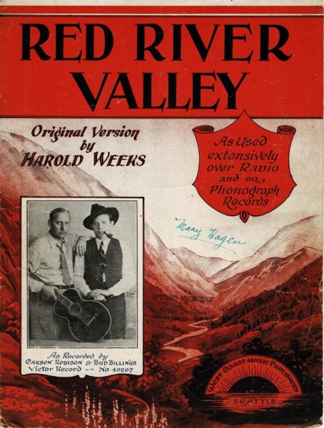 Sheet music cover with image of two white men and an illustrated valley in the background