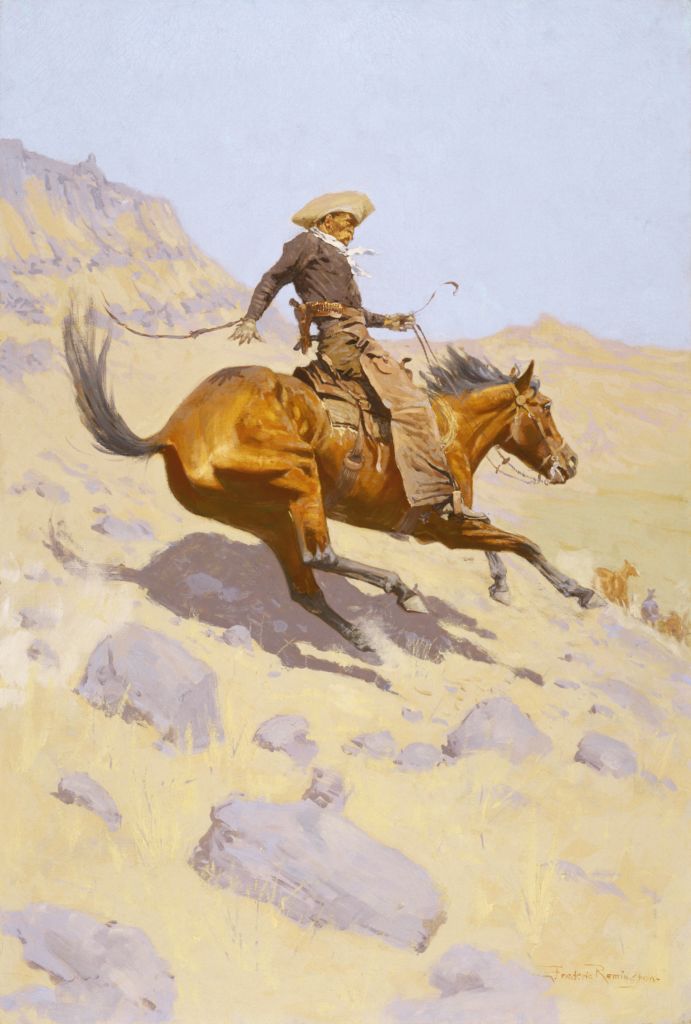A cowboy riding a horse swiftly at an angle down the side of a ridge. 