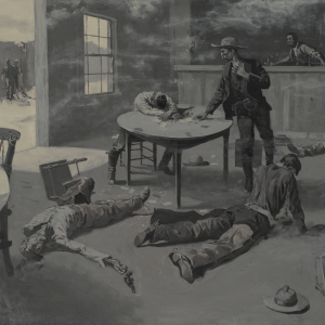 One man standing at a card table with the men shot on the ground around him