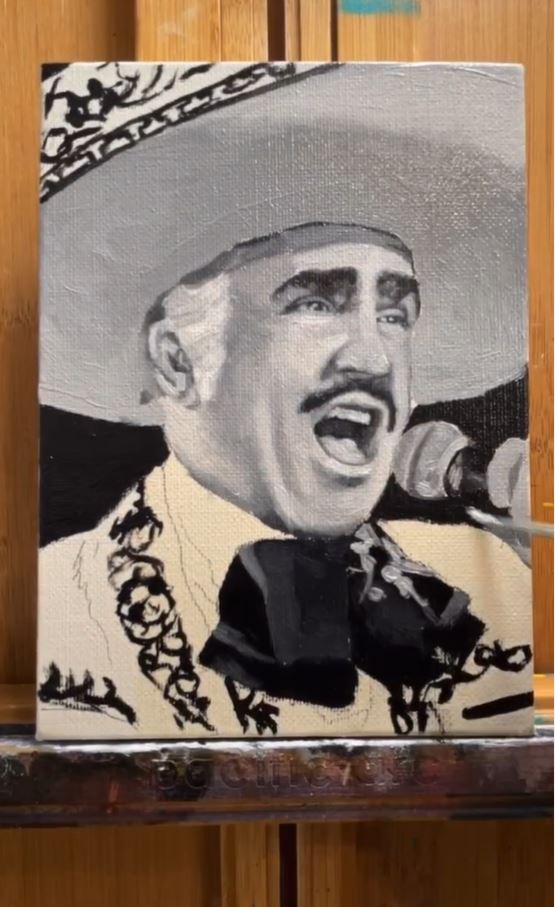 small black and white painting of man singing