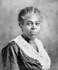 head shot of a black woman posing for a photograph